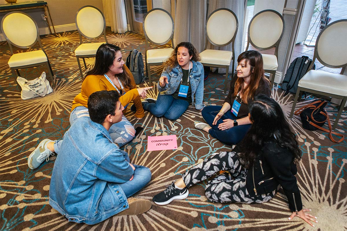 Birthright Israel Fellows discussing Jewish values at a training seminar.